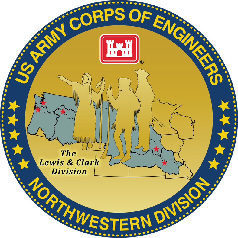 The division coin, updated in 2022 shows the Shoshone guide Sacajawea or Sacagawea (on the left of the coin face) who helped the Lewis and Clark with Expedition (Lewis and Clark are also represented William Clark in the middle wearing a coonskin cap and carrying a guide stick and Meriwether Lewis on the right carrying a gun and wearing military dress) in exploring the Louisiana Territory. Sacagawea traveled with the expedition thousands of miles from North Dakota to the Pacific Ocean which is shown in the background of the coin in green by outlining the area of responsibility of the Northwestern Division with points of the Omaha, Kansas City, Portland, Seattle and Walla Walla Districts marked in red. The words The Lewis and Clark Division are to the lower left and the circle is outlined in Navy Blue with the words US Army Corps of Engineers in gold and the words Northwestern Division below .  The division coin, updated in 2022 shows the Shoshone guide Sacajawea or Sacagawea (on the left of the coin face) who helped the Lewis and Clark with Expedition (Lewis and Clark are also represented William Clark in the middle wearing a coonskin cap and carrying a guide stick and Meriwether Lewis on the right carrying a gun and wearing military dress) in exploring the Louisiana Territory. Sacagawea traveled with the expedition thousands of miles from North Dakota to the Pacific Ocean which is shown in the background of the coin in green by outlining the area of responsibility of the Northwestern Division with points of the Omaha, Kansas City, Portland, Seattle and Walla Walla Districts marked in red. The words The Lewis and Clark Division are to the lower left and the circle is outlined in Navy Blue with the words US Army Corps of Engineers in gold and the words Northwestern Division below .